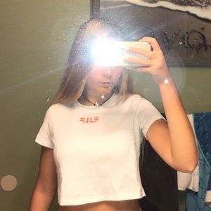 White LF crop top with neon lettering